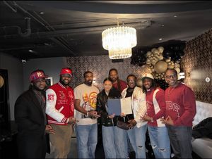 Boston Alumni Chapter brothers receiving Certificate of Recognition from City of Boston representative