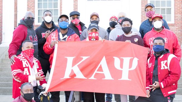 Community members at Cuts and Curls event